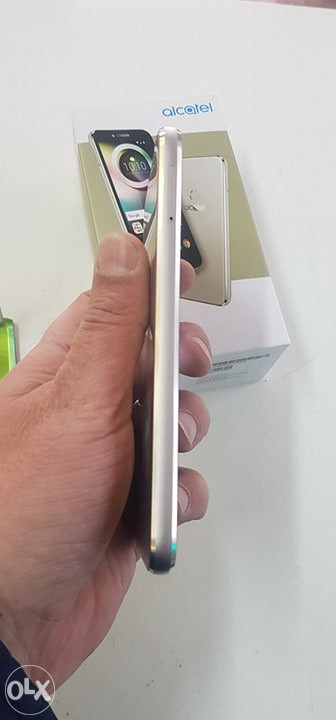 Alcatel Shine Lite.. 5080x