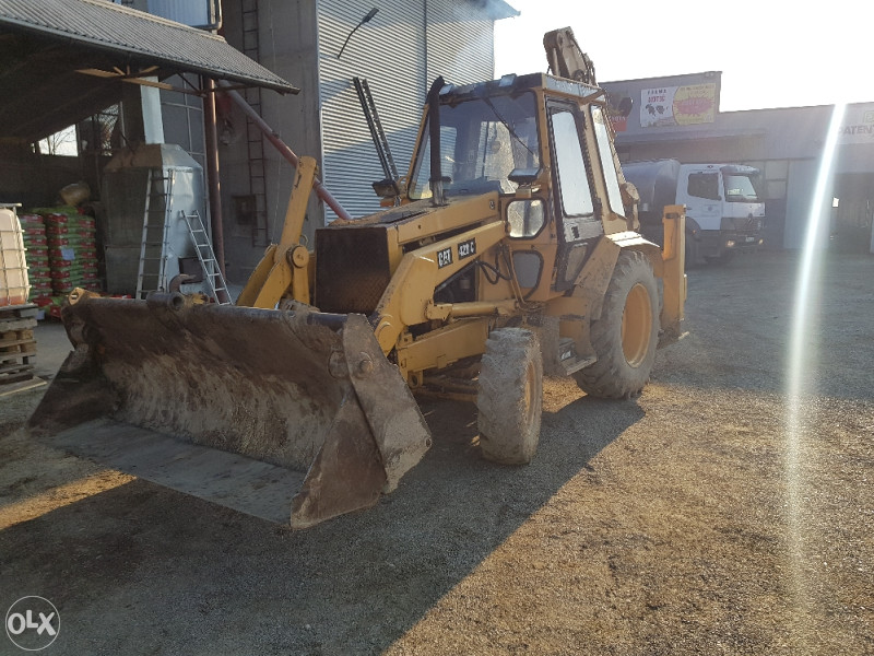 Kombinirka bager Cat skip